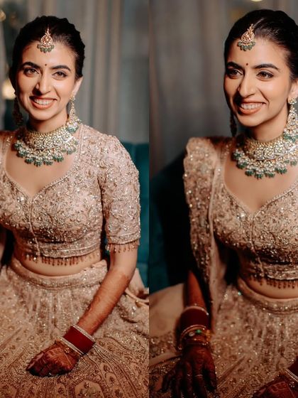 Just married magic. This bride radiated pure joy in her peach-golden lehenga, with her hair in a mogra bun and a soft, natural glam that felt effortlessly her.