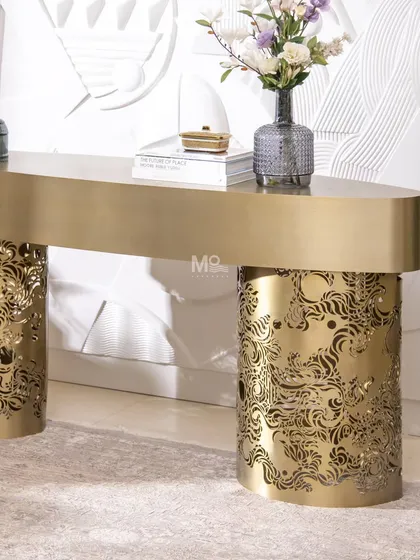 We see furniture as functional art. The Ferrosa Console is a testament to this, where we reimagined traditional Indian Jaali work in a contemporary form. The intricate laser-cut carvings in a brushed antique gold finish create a piece that balances opulence with modern restraint.