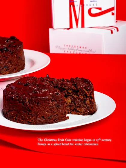 A slice taken from our Christmas Fruit Cake, showing its dense, fruit-packed interior.