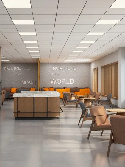 The faculty lounge at BML Munjal University in Haryana, featuring a coffee counter and varied seating areas. We design these spaces to encourage informal discussions and interdisciplinary collaboration among faculty members in a comfortable setting.