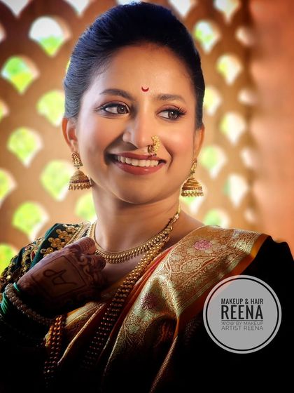 The smile of a happy bride. Aditi looked absolutely gorgeous in her traditional saree with an intricately embroidered blouse.