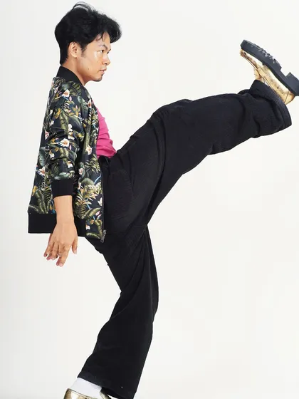 Another shot from the dance editorial, proving that a good grooming job holds up to high kicks and powerful movements.