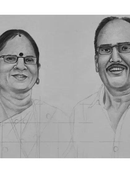 The drawing process for the portrait of the older couple. This image shows the grid still visible as I carefully shade the faces to achieve a realistic likeness.
