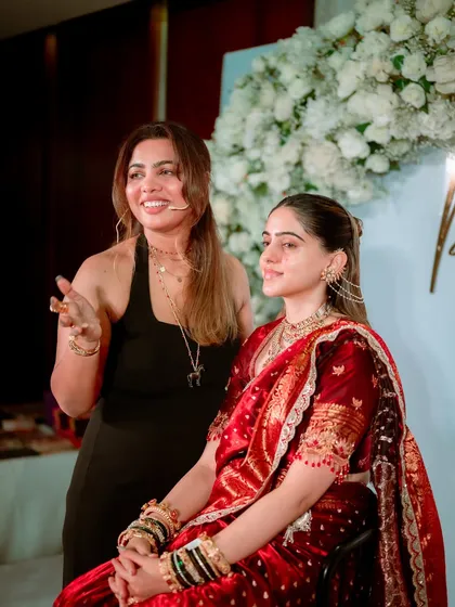 Here I am with a model after completing a live demonstration of a traditional Maharashtrian bridal look. My classes show you how to bring a complete vision to life, from makeup to styling.
