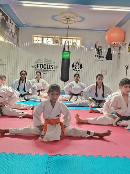 Karate is not just about fighting; it is about discipline and physical excellence. Our training includes rigorous fitness routines to develop strength, stamina, and incredible flexibility from a young age.