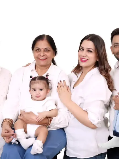 A multi-generational family portrait, including grandparents, parents, and children. We create memories for the entire family.