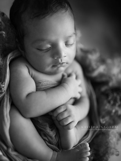 Black and white isn't just a style; it's about revealing the truth. This portrait of a three-week-old newborn focuses on emotion and connection, creating an image that feels real.