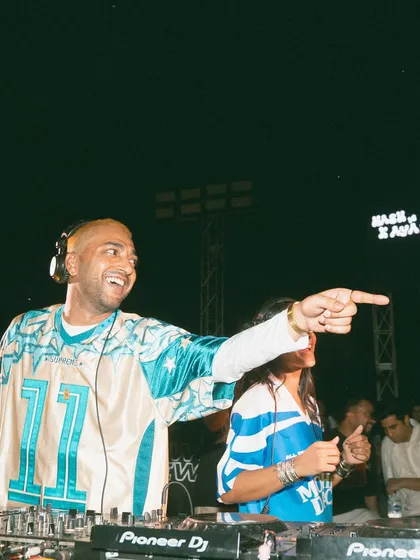 The connection with the crowd is what fuels me. A moment of pure joy, pointing out to someone vibing in the front row during a high-energy set in Delhi.