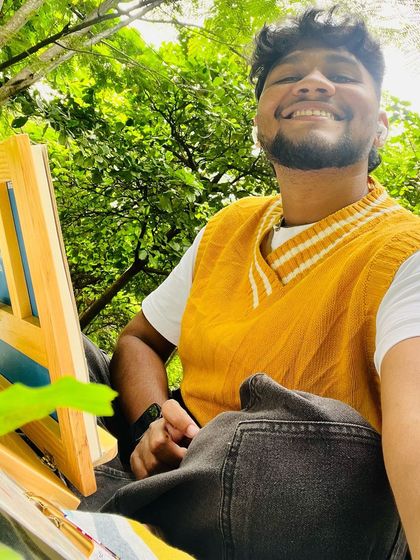 A happy selfie taken during a break from painting at Cubbon Park. The lush green background shows why this is one of my favorite places to paint.