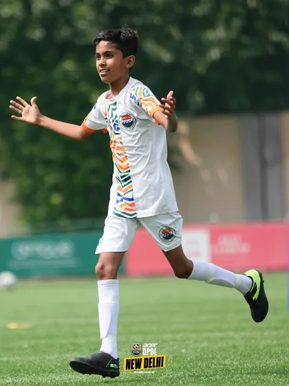 A young player on the run, showcasing the speed and agility we develop through our specialized conditioning programs.