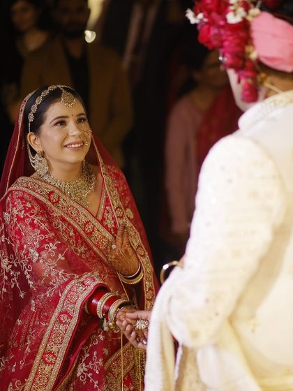 A candid moment of love during the wedding ceremony. My bride looks radiant and happy, with her makeup holding up perfectly through all the emotions of the day.