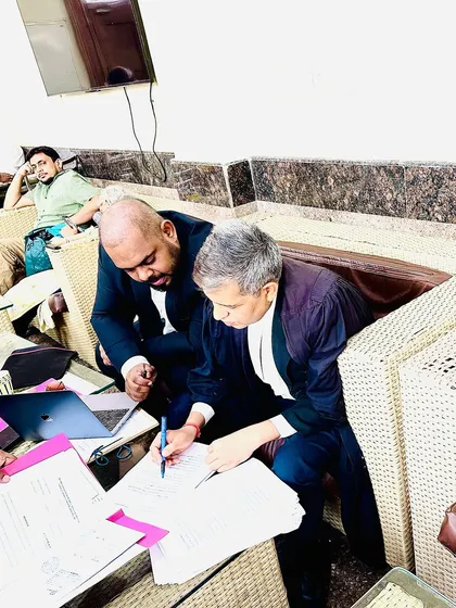 Finalizing the paperwork. The attention to detail is what wins cases.