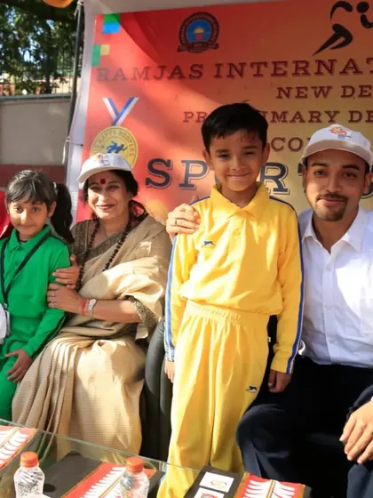 A moment with a young athlete at the Ramjas International School Sports Day. Inspiring the next generation is one of the most rewarding aspects of my work.