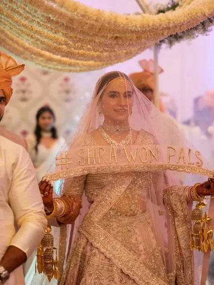 The plan was an outdoor Bangalore wedding, but the sky had other ideas. This shot captures the bride's stunning entrance after we moved the entire wedding indoors in record time. It proves that even with chaos, the story can be perfect.