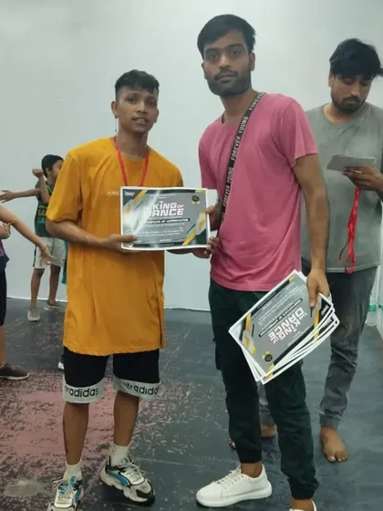 This student is a fantastic freestyle dancer. It's great to see him get this prize for his hard work.