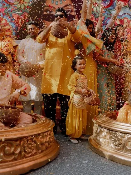 The absolute chaos and fun of a Haldi ceremony, with friends and family showering the couple with flower petals. These are the memories filled with laughter that you'll look back on for years.