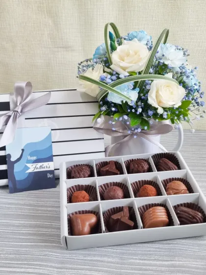 This version of the Father's Day chocolate gift includes a special "Happy Father's Day" tag, adding a personal touch to your thoughtful present.