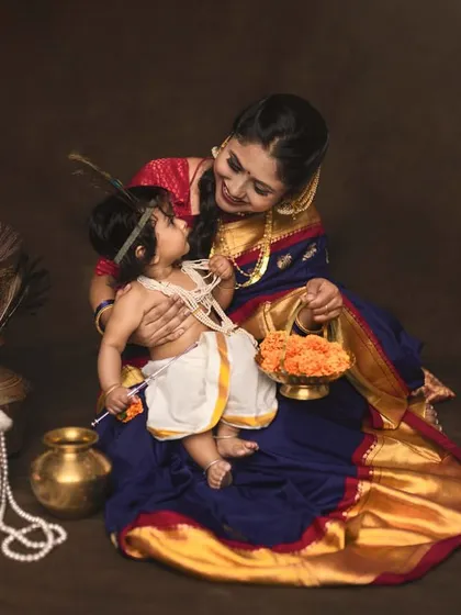 The bond between mother and child is the heart of these Yashoda-Krishna portraits. Her adoring gaze and his innocent expression make this a truly special moment.