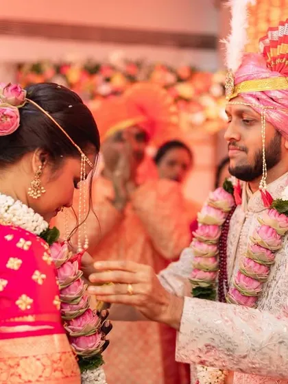 A sweet moment between the bride and groom during their wedding ceremony.