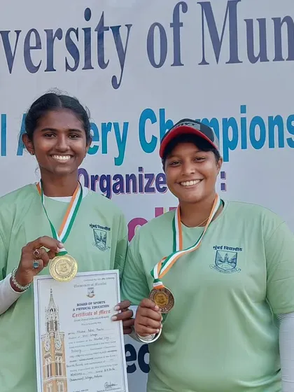 Two of our archers showing off their gold and bronze medals. We train both recurve and compound archers to reach their highest potential.