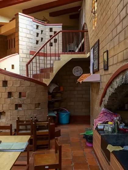 The interior of the Promise Center Montessori from the late 90s. This project featured a child-sized kitchenette and a distinctive spiral staircase, showcasing our early explorations in designing spaces tailored to their users.