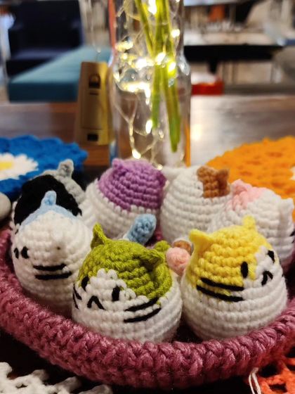 My collection of chubby cat keychains. These little guys come with different colored patches on their heads, including yellow, green, pink, blue, and grey.