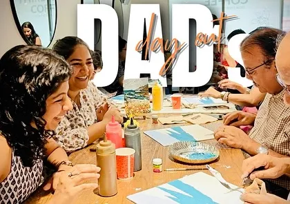 A perfect "Dad's Day Out". Daughters and fathers bonding over brushes and colors, sharing a new and creative experience together.