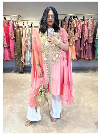Trying on a beautiful pastel pink embroidered kaftan. This showcases my work with brands like Pernia's Pop-Up Shop to feature new collections of Indian ethnic wear.