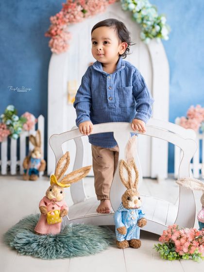 Standing on a little white bridge in our bunny garden. I create multi-part sets to give you a variety of beautiful photos from a single session.