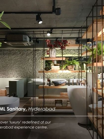 The FCML Sanitary experience centre in Hyderabad, where luxury is redefined through an industrial-chic aesthetic. The design uses raw textures, metal shelving, and lush greenery to create a unique and memorable showroom.