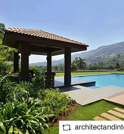 The pool and gazebo area of the Khandala villa, set against the backdrop of the mountains. The landscape design is as important as the architecture in creating a holistic retreat.