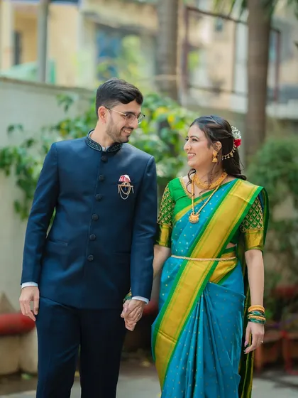 A walking shot of the couple holding hands. This creates a sense of movement and tells the story of them starting their journey together.