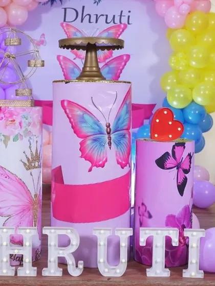 Another detail shot of the butterfly-themed pedestals and the light-up name sign. I can customize the prints and colors to match your exact vision.