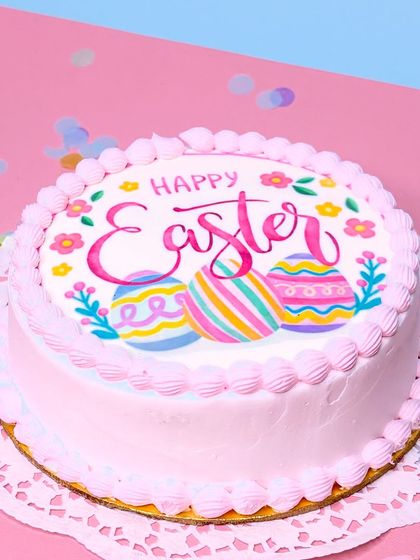 Something perfect for your Easter lunch spread. This is my classic chocolate cake decorated to look like an adorable Easter painting, complete with colorful eggs and "Happy Easter" script.