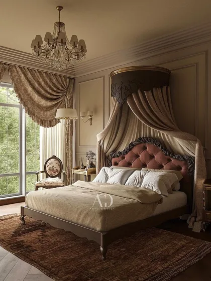 This bedroom showcases luxury in every detail, with a regal, canopied bed as its centerpiece. The rich rug and heavy, ornate drapery contribute to a feeling of warmth and royal harmony.