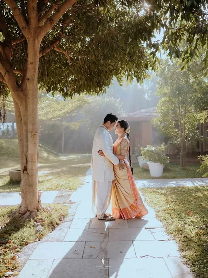 A quiet moment of connection between the couple, bathed in the soft morning light. I believe the most powerful stories are often told in the gentle, unspoken moments just like this one.