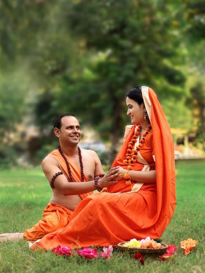 A tender moment captured during our Ram-Sita maternity session. The focus is on the couple's loving interaction, celebrating their bond as they await their child.