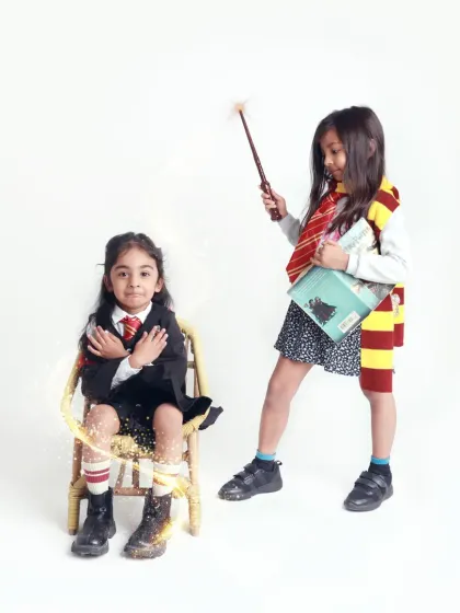 Double trouble! Two little wizards conjure up some magic in this fun, Harry Potter-inspired sibling photoshoot.