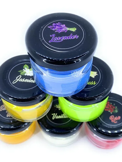 I offer a wide variety of fragrances in my scented jar candles, all handmade with eco-friendly soy wax. This pyramid shows some of my most loved scents like Lavender, Jasmine, and Rose.