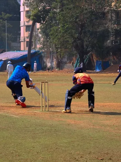 A batsman playing a shot during our practice match. These games are key to our tournament preparation.