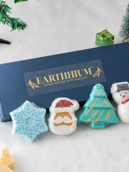 Make bath time merry with my Christmas-themed bath bombs. This gift box includes four festive shapes: a snowflake, Santa Claus, a Christmas tree, and a snowman, each ready to fizz and fill your bath with holiday cheer.