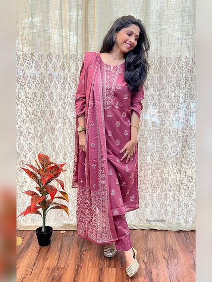 Our festive pieces are flying fast. This beautiful mauve printed suit set with an embroidered dupatta is a perfect example of our handcrafted festive collection.