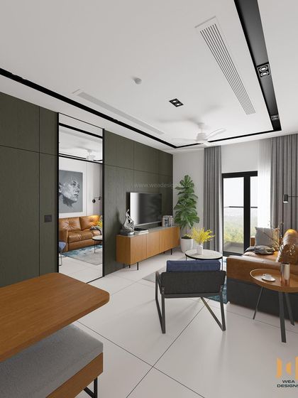 A view showing the mirrored door that conceals the bedroom entrance, a clever trick to make the small space feel larger.