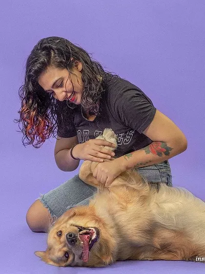 A candid moment of play during a studio shoot for a pet brand. Even in a formal setting, we make sure the animals are relaxed and happy, which brings out their best, most joyful expressions.