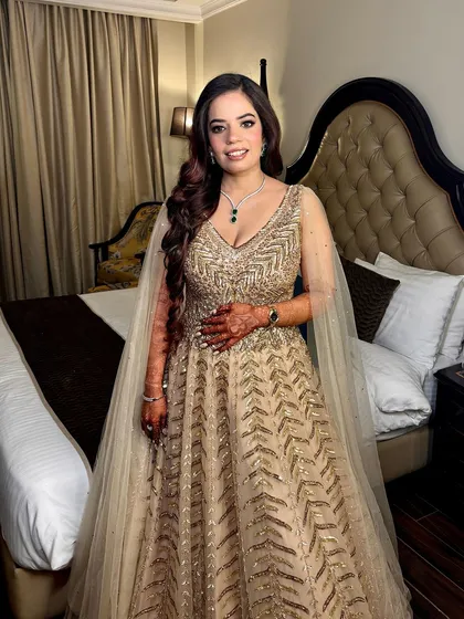 A full-length shot of Ashima, looking poised and elegant in her engagement attire.
