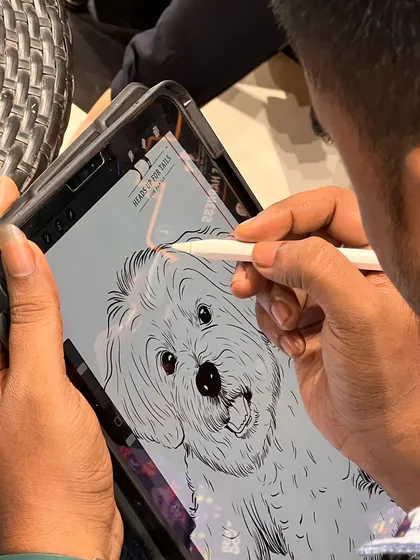 Here I am, working on a detailed digital portrait of a fluffy dog. I draw every strand of fur to capture the pet's texture and personality.