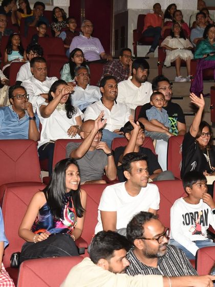 The proud audience of parents and family, cheering and waving during our student showcase. The energy and support from our community is what makes these events so special.