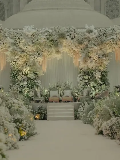 Set against the majestic architecture of Fairmont Jaipur, I designed this all-ivory mandap to feel like a serene floral haven. The sheer volume of white blooms created a sense of pure, understated elegance.