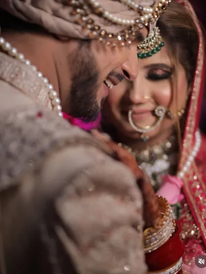 A candid, joyful moment between the bride and groom. Capturing this pure happiness is what weddings are all about, and I love that my work is a part of these memories.
