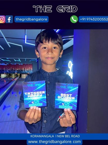 This young champion won both "Trigger Happy" and "Best Scorer" in his laser tag game.